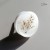 light white knobs with ears of grass 50mm.jpg